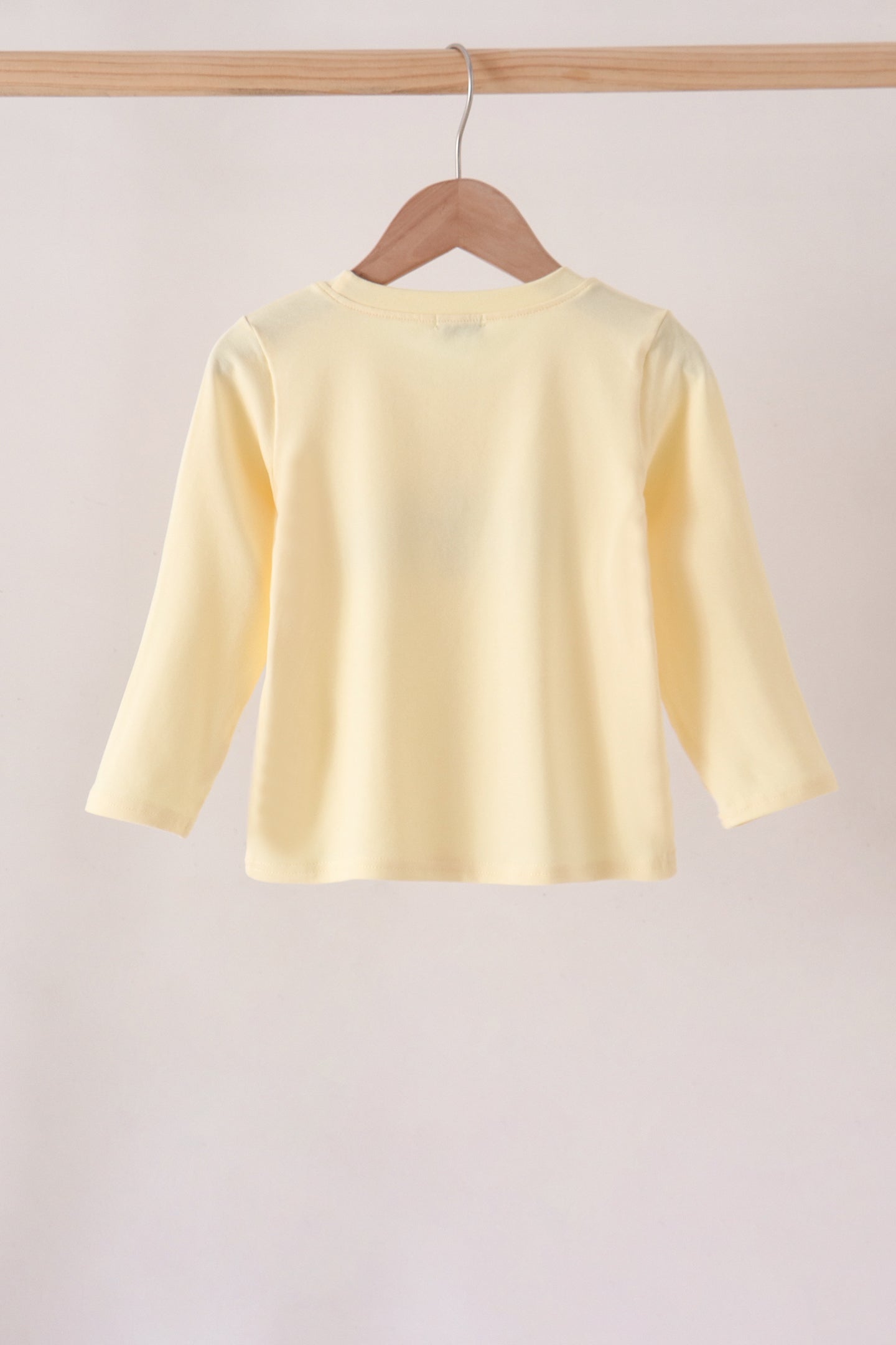 Beige character embroidery top