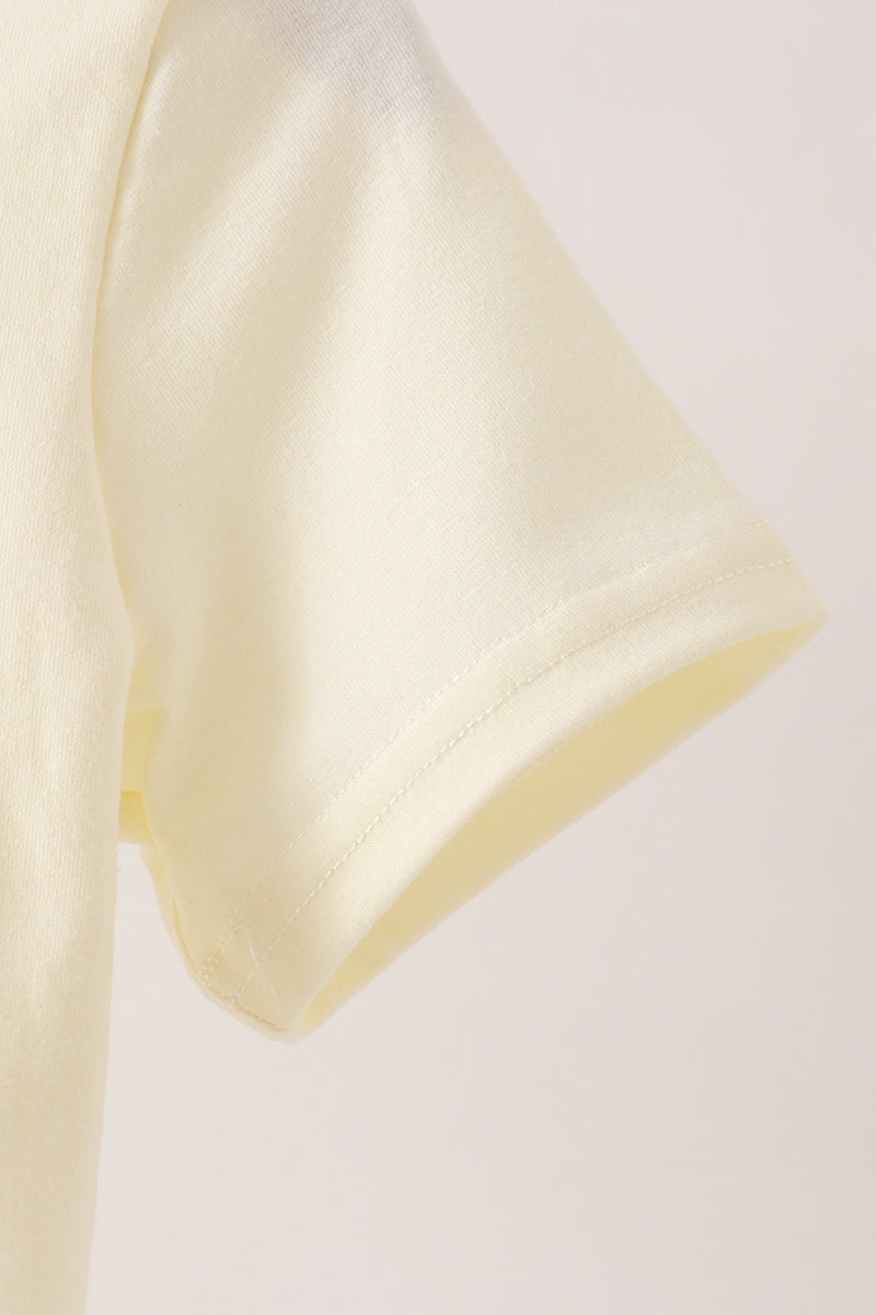 Beige character french knot top