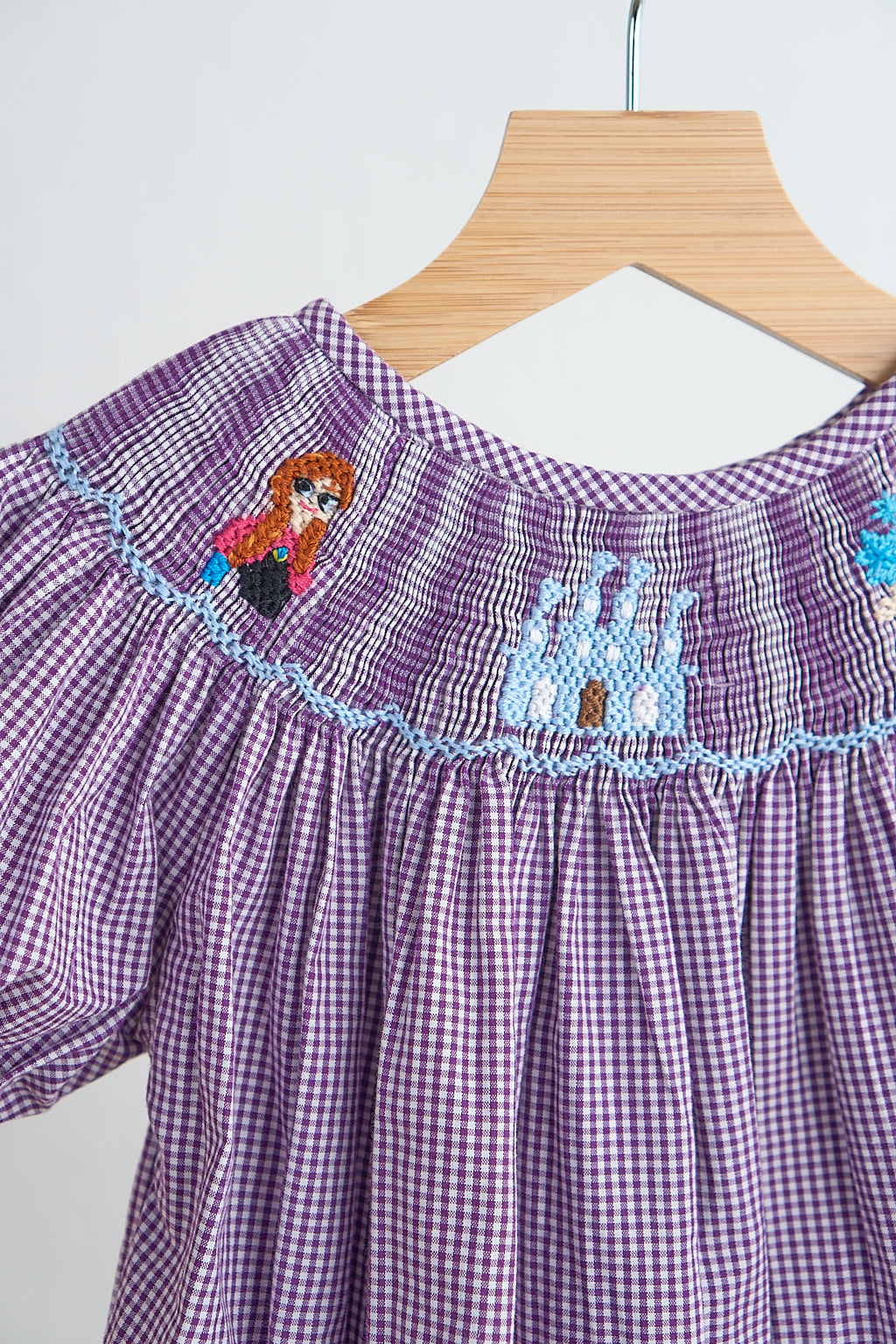 F*r*o*z*e*n* Purple castle hand smocked gingham girl romper